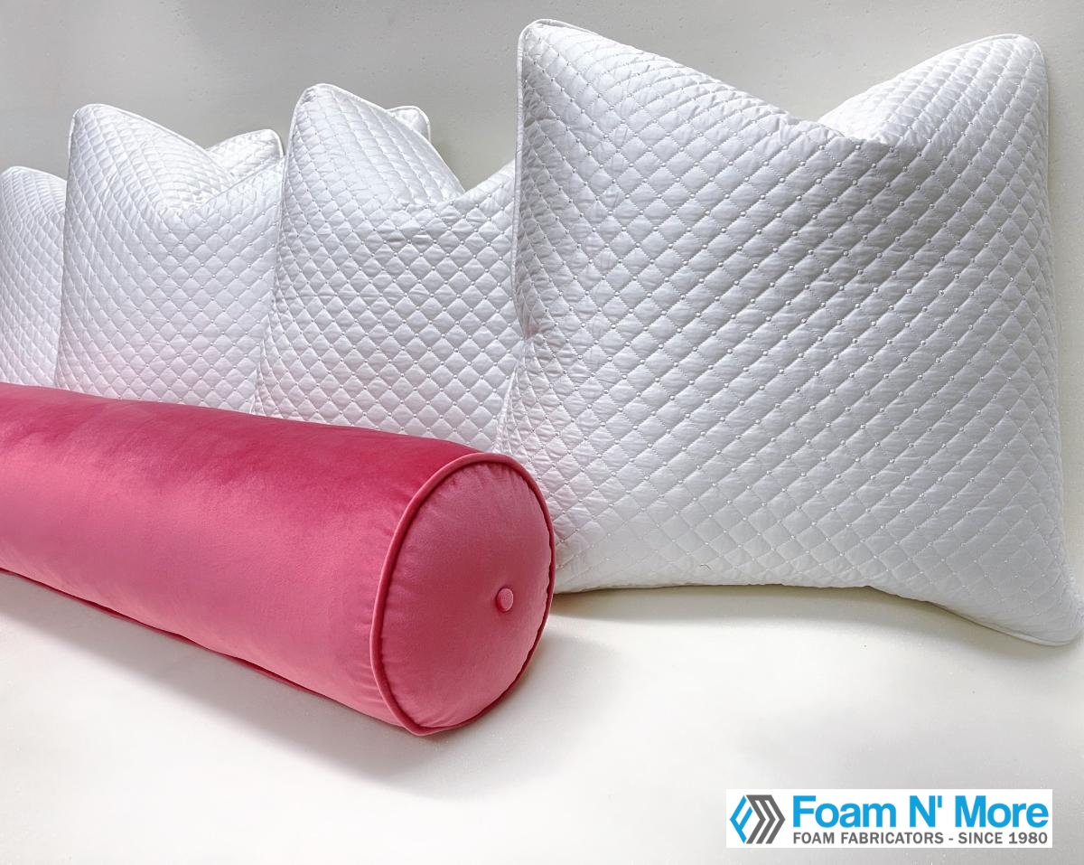 White pillows with pink bolster